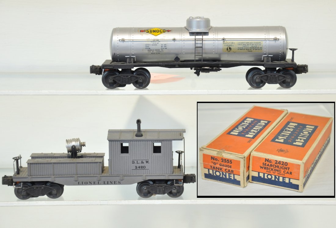 Nice Boxed Lionel 2555 & 2420 Freight Cars: Includes a 2420 searchlight work caboose; 2555 Sunoco tank, decals are 100% with a few minor dark spots, nice silver with straight frame. They show light playwear with C8 boxes & inserts, C7-7+