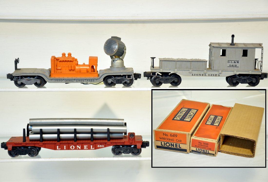 3 Lionel Freight Cars, 2 Boxed: Includes a 6511 flat with pipes, cast bolsters version; 6419 work caboose, ob with insert; 3520 searchlight car with ob. All could use a cleaning, but only show light to moderate playwear, C7