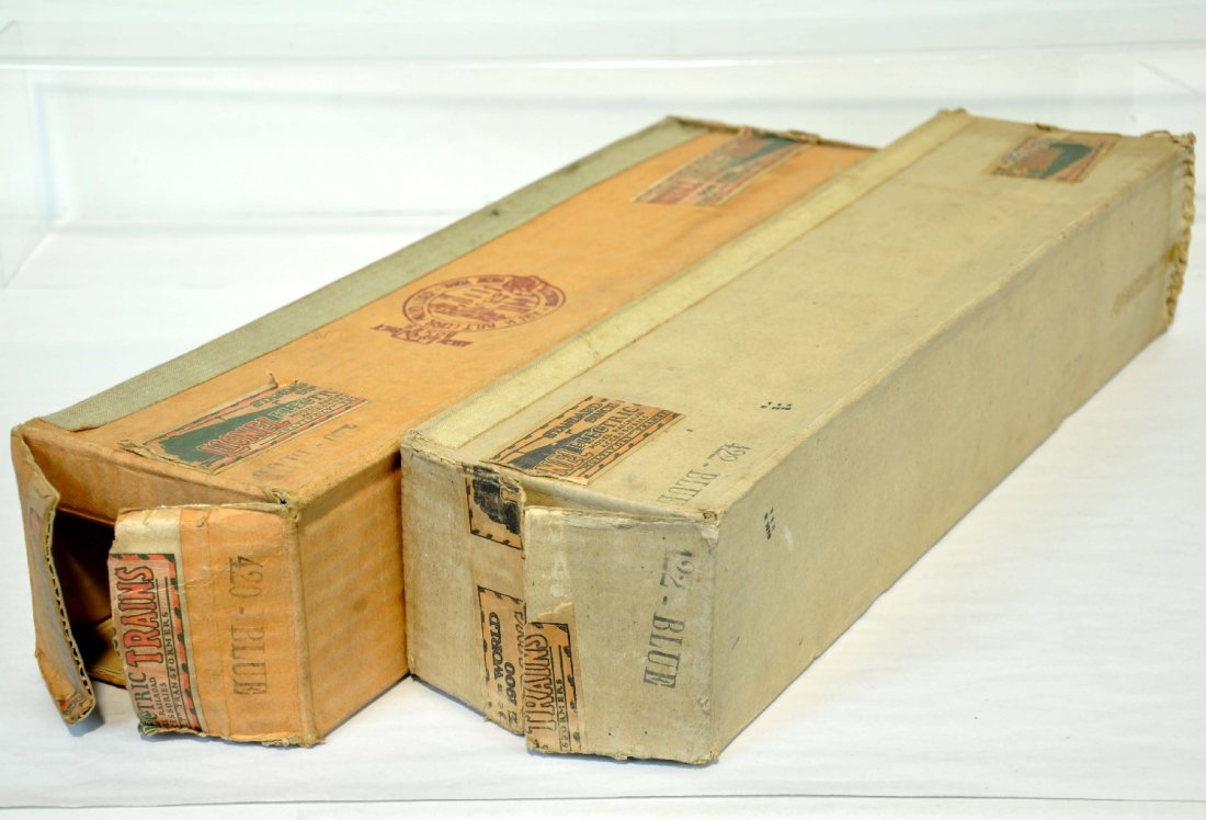 2 Lionel Blue Comet Set Empty Boxes: Standard Gauge. Includes a 422 & 421, both with early tape, two different types of cardboard as photographed. 1 missing 3 flaps 1 side; other missing 1. They are clean with clear stampings