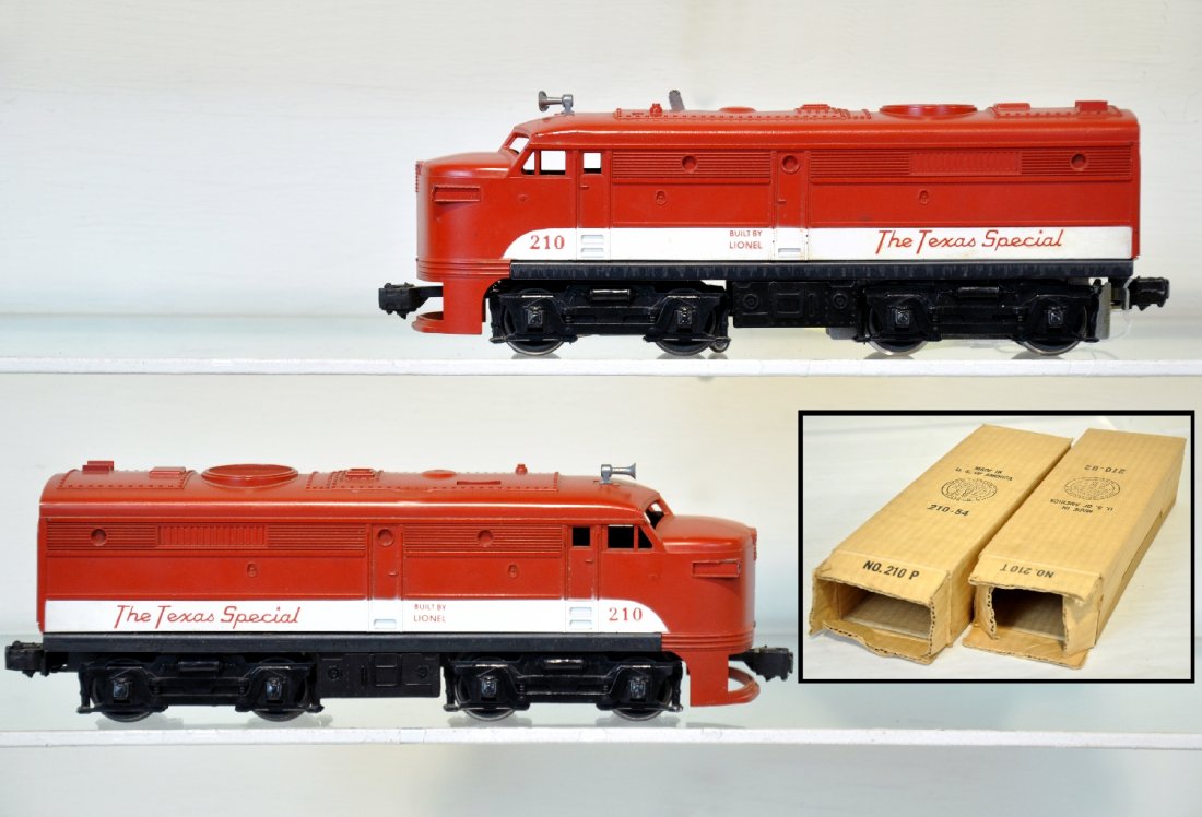 Nice Boxed Lionel 210 TS Alco AA Diesels: Clean uncataloged set with intact cowls. They match in color and show light playwear with C7+ bodies and bricky boxes, light stain on roof of power A unit