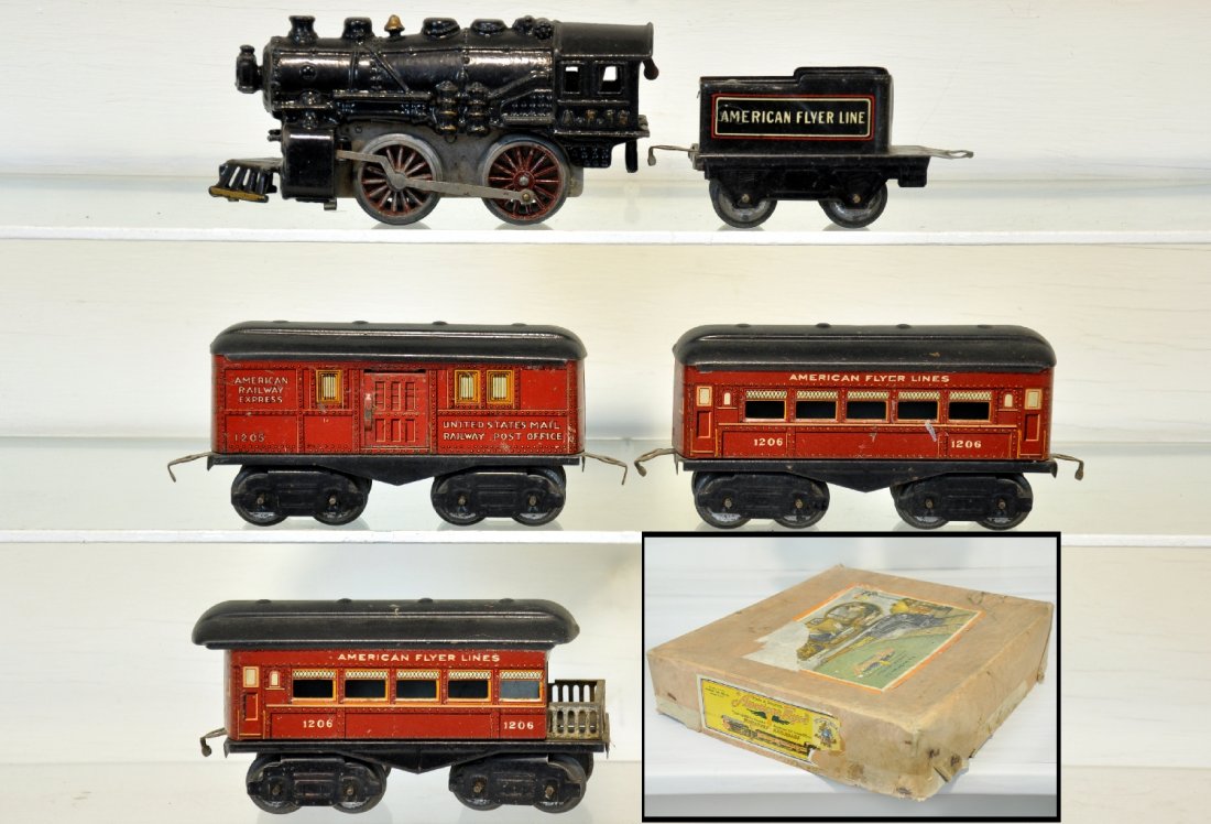Boxed American Flyer 16 Set: O Gauge. Includes a 16 loco, largest production wind-up for Flyer. Mechanism is functional with key; 120 tender; 1205 baggage; 1206 Pullman; 1206 observation. All are clean & shiny with track & setbox