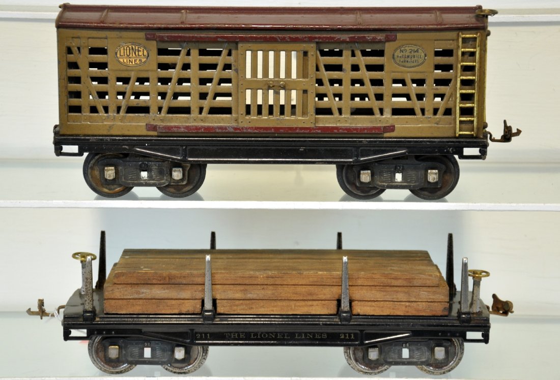 Early Lionel 211 & 213 Freight Cars: Standard Gauge. Includes a 213 Mojave stock car & 211 lumber car with original load. They show moderate playwear, C5