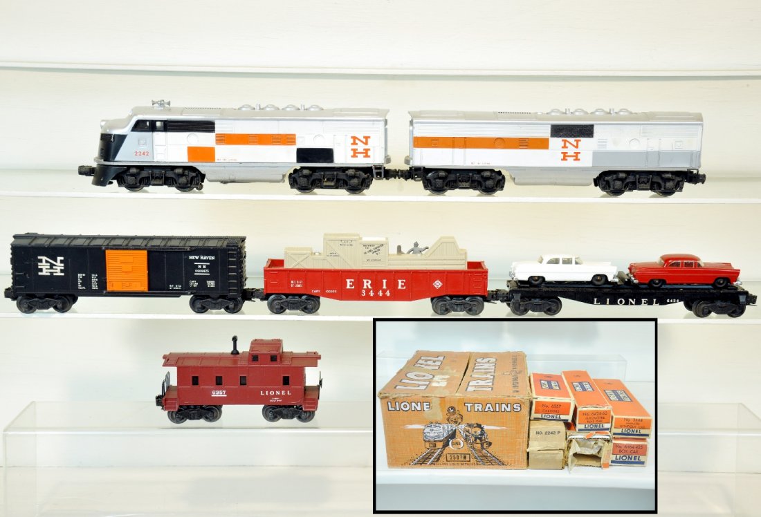 Boxed Lionel NH F3 Set 2207W: Circa 1957. Includes 2242 NH F3 AA Diesels, fairly clean with nice silver and clean battery box; 6424 auto-loader; 3444 cop & hobo car; 6464-425 NH boxcar, type IIB; 6357 caboose. All show light to mo