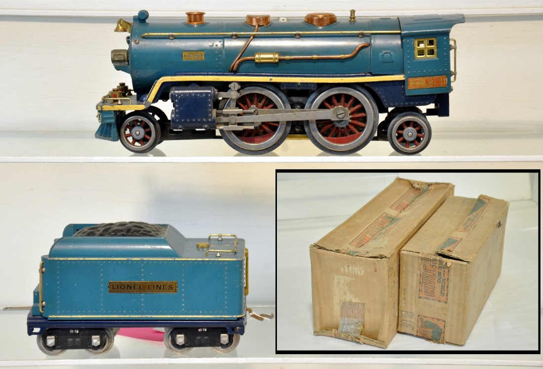 Nice Boxed Lionel 390E Blue Comet Loco: Standard Gauge. 1930 production, two-tone blue with cream stripe. Frame has small distortion, still tracks, has 1 fatigued pony wheel with 1 original flag; matching 390T tender. Both are clean with ni