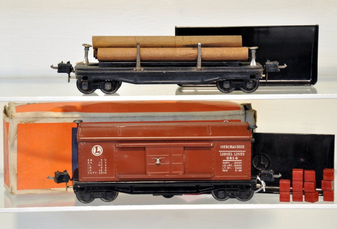 Lionel 3811 & Boxed 3814 Freights: Includes a late 3814 operating merchandise car, includes 11 original cubes & bin. Late heat stamped lettering with black trim, just missing the fish belly cover; 3811 lumber dump with large logs & bin