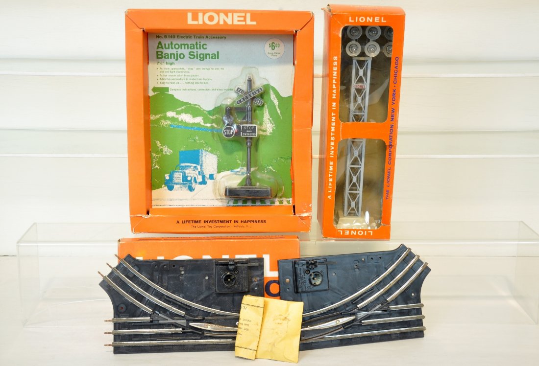 Boxed Lionel B140; 195 & 1021 Late Accessories: Includes a B140 banjo signal, sealed on C8 card; 195 floodlight tower, window box, no insert; 1021 manual switches. All otherwise show light playwear, C8-10