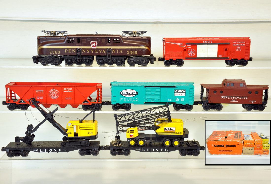 Scarce Boxed Lionel 2360 Set 2575: "The Dynamo" Circa 1961. Includes a clean 2360 dual motor GG1 with single stripe & even ventilators; 6828 Flat with P&H crane, 1 broken boom support, added decals; 6630 fire safety boxcar; 6464-900 NY