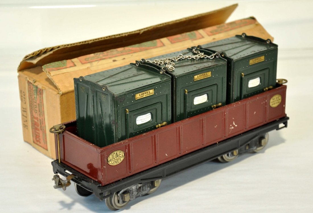 Lionel 212 with 205s: Includes a boxed 212 wine gondola, clean C7; with a set of 205 containers, complete with original labels and chains, C6+