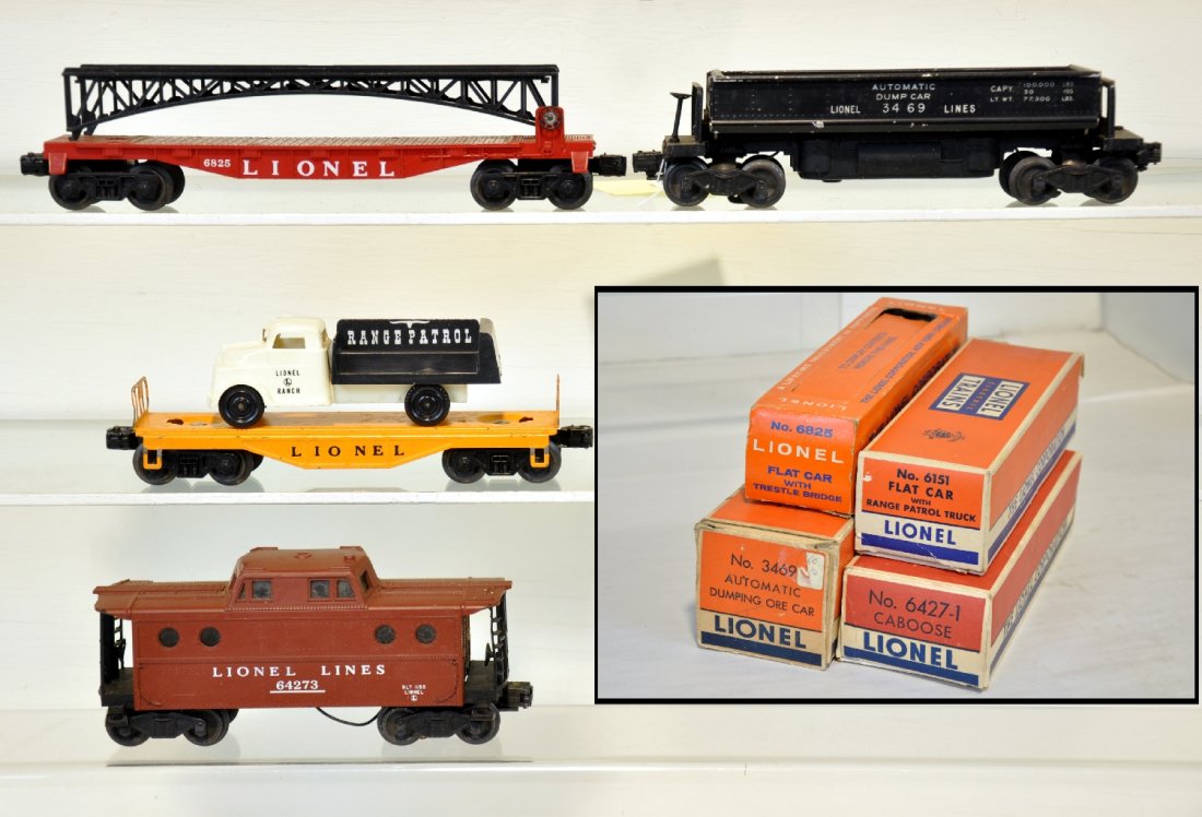 4 Boxed Lionel Freight Cars: Includes a 6151 Range Patrol flat; 6825 flat with black bridge; 6427 N5c caboose; 3469 coal dump car. All show light to moderate playwear with C7+ boxes, C6-7