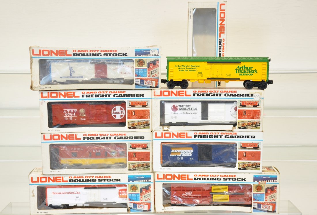 8 Lionel MPC Freight Cars: Includes Florida East Coast Bay window caboose, Arthur Treacher reefer 7512, Express Mail operating boxcar 9229, World's Fair boxcar 9467, Bonanza reefer 7513, Mounds Candy reefer 9886, Santa Fe boxca