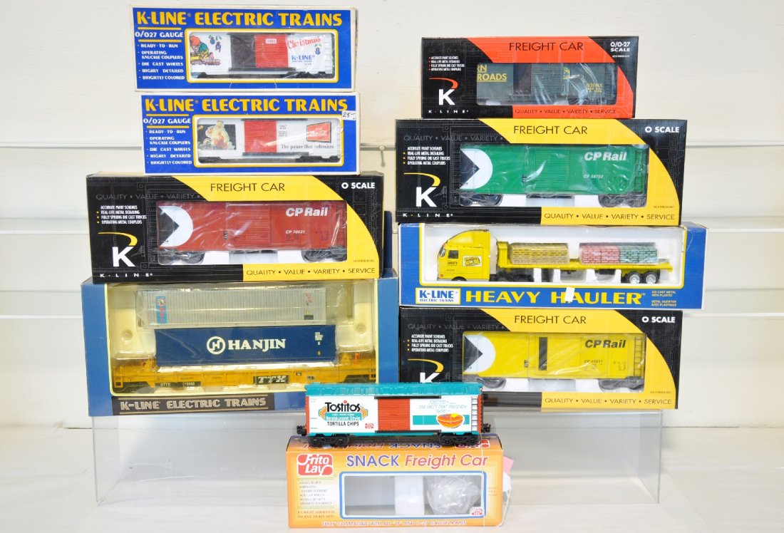 8 K Line Freight Cars: Includes Frito Lay Tostitos boxcar TE4310, Canadian Pacific boxcar K761-1214, K761-1213, K761-1212, Quikrete tractor flatbed K-81073TT, Coca-Cola Historical boxcar Christmas Edition K-6447, Eastern Ra