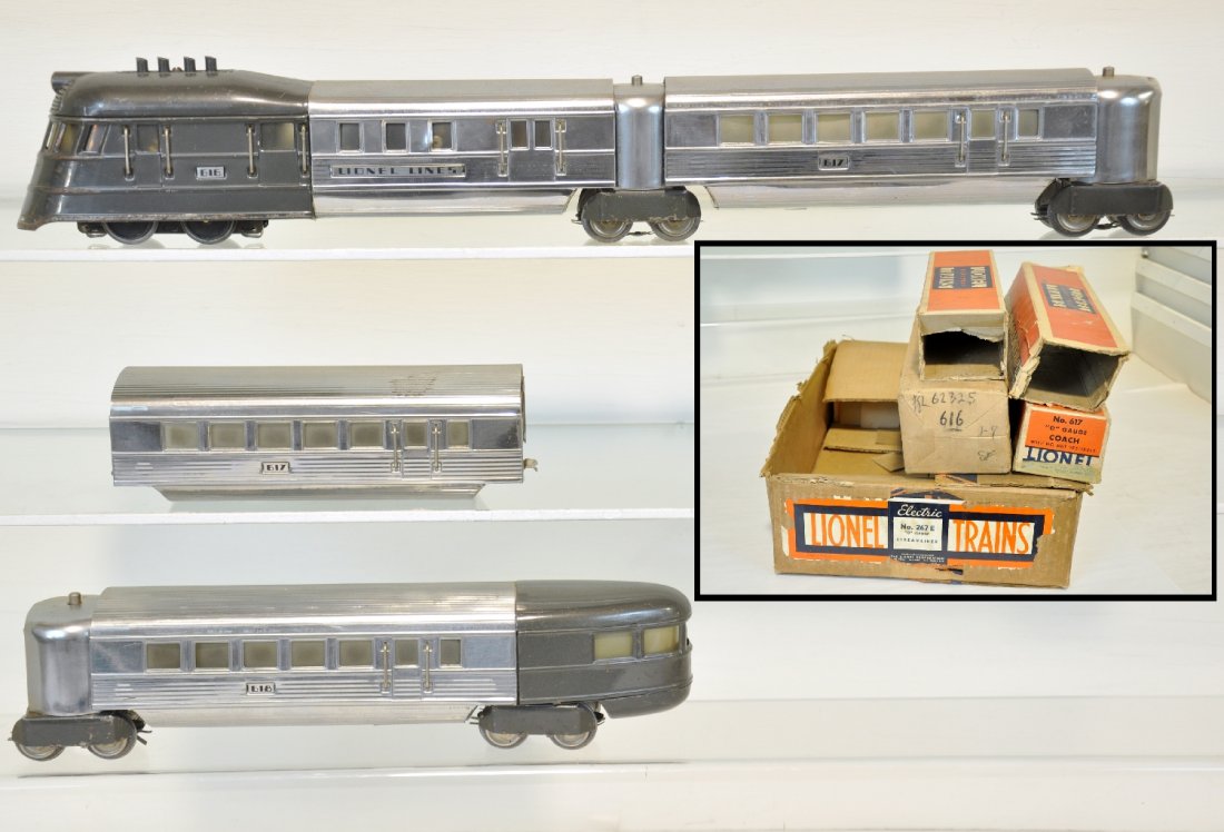Boxed Lionel Flying Yankee Set 267E: Includes a 616W diesel; 2 #617 coaches, 1 has a light disturbance on roof (4"); 619 observation. All are clean & shiny, otherwise showing light to moderate playwear with boxes, some missing flaps and 