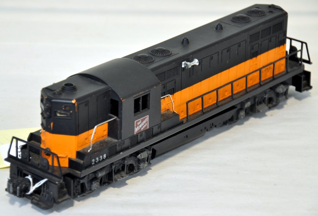 Lionel 2338 MR GP7 Diesel: Clean black & orange painted on orange mold. The battery box is clean and shows light to moderate playwear, C7-