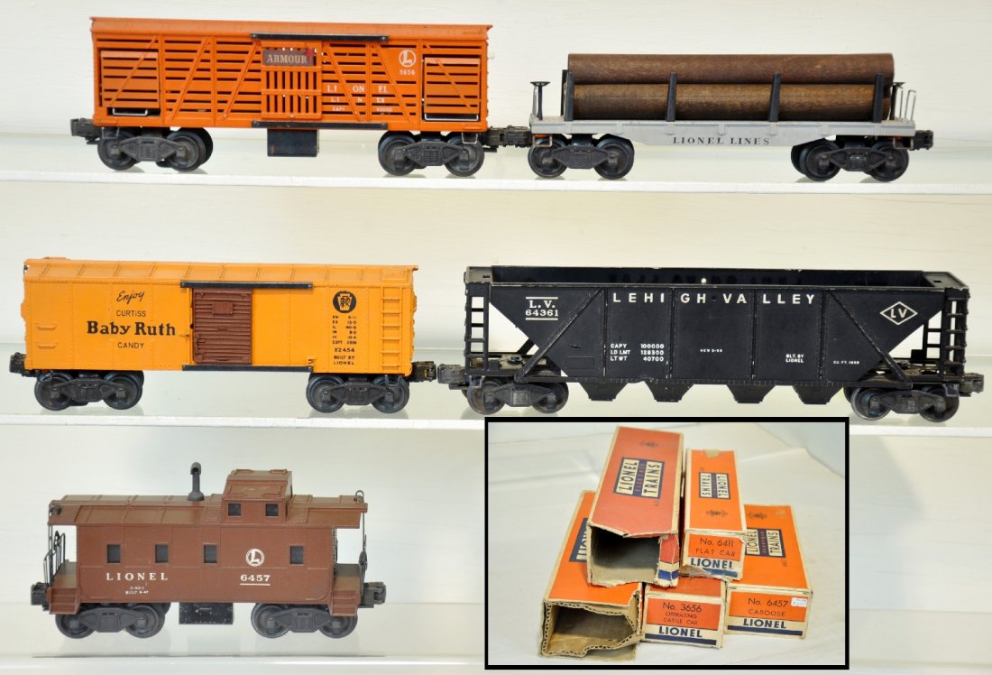 5 Boxed Lionel Freight Cars: Includes a 6436 quad hopper, C6; 6457 caboose; 3656 Armor stock car; 6411 flat with repro logs; 2454 BR boxcar. They show light to moderate playwear, C7