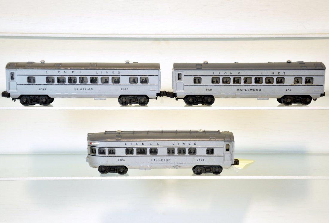 3 Lionel 1951 Passenger Cars: Make a set with a 2033, 681 or 675! Includes a 2421 Maplewood Pullman; 2422 Chatham Pullman; 2423 Hillside observation, all have 1951 gray roofs with black stripes. They show moderate playwear, C5+-6