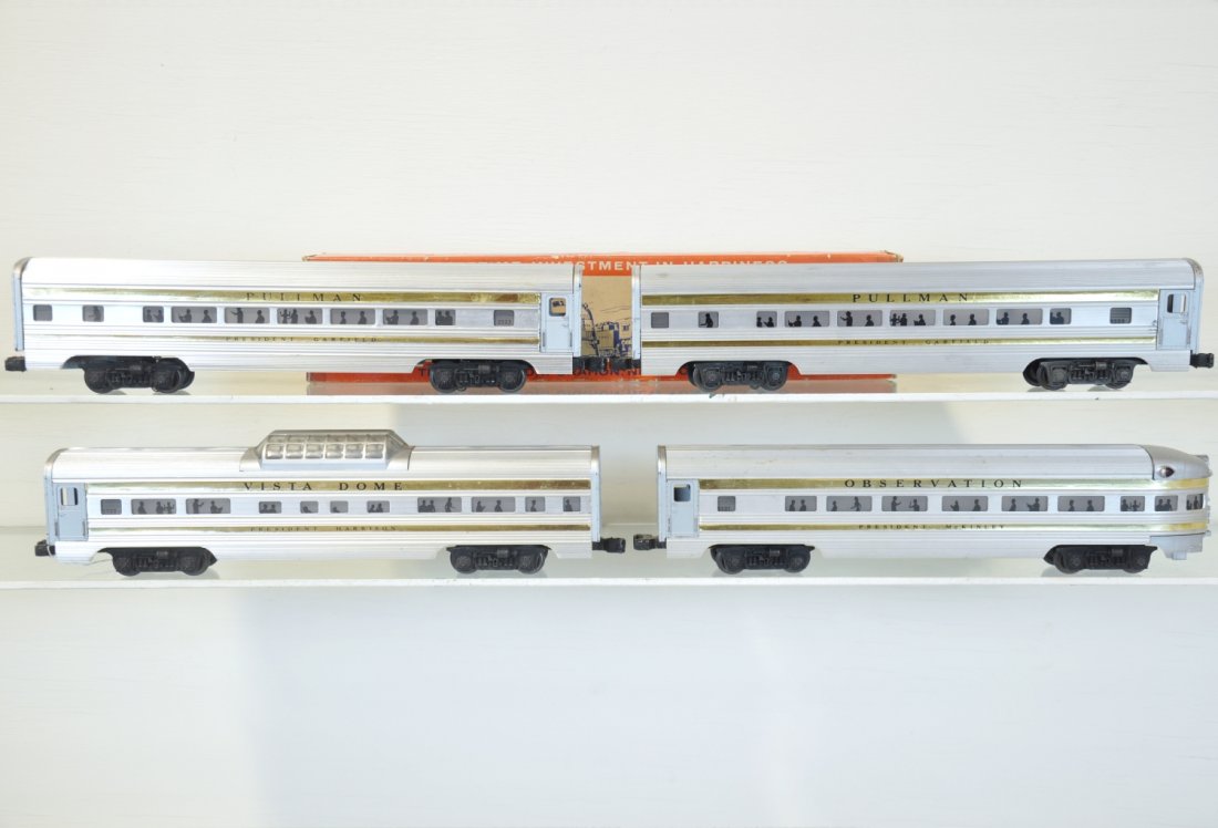 4 Lionel Presidential Passenger Cars: Includes 2522 Pres Harrison Vista-dome; 2 #2523 Pres Garfield Pullmans, 1 worn ob; 2521 Pres McKinley observation. All have original stripes and show moderate playwear, C6