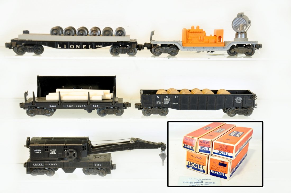 5 Boxed Lionel Freight Cars: Includes a 3520 searchlight car; 6460 crane, hairline cracks in boom support with 1 insert; 6462 gondola with drums; 3461 operating lumber dump, replaced logs with bin & instructions; 6262 wheel car.