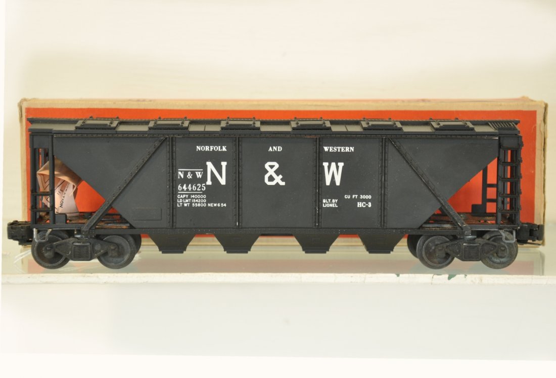 Mint Boxed Lionel 6446-25 N&W Hopper: Super covered Cement car, nice matte patina, small blemish on one truck side frame, but unrun with inspection label. OB has flaps reattached one side, otherwise C9