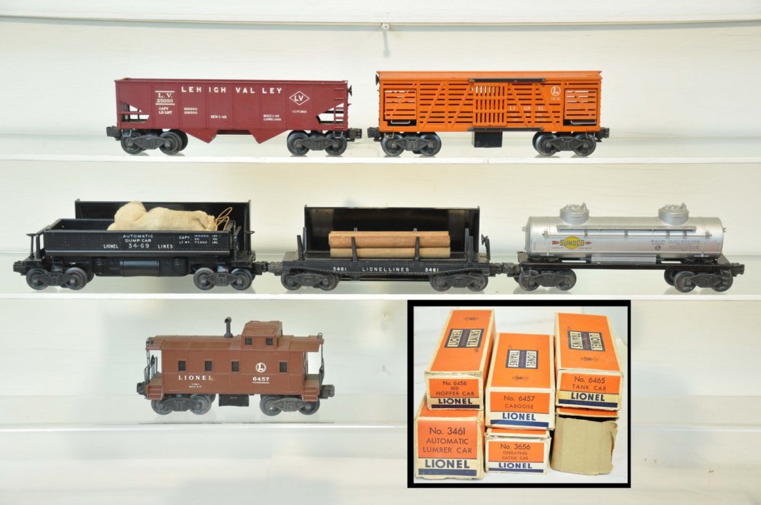 6 Boxed Lionel Freight Cars: Includes a 3469 coal dump, complete; 3461 log dump complete; 6465 tank car; 3656 cattle car, car only; 6457 caboose; 6456 LV hopper. All show light playwear with boxes, C7-7+