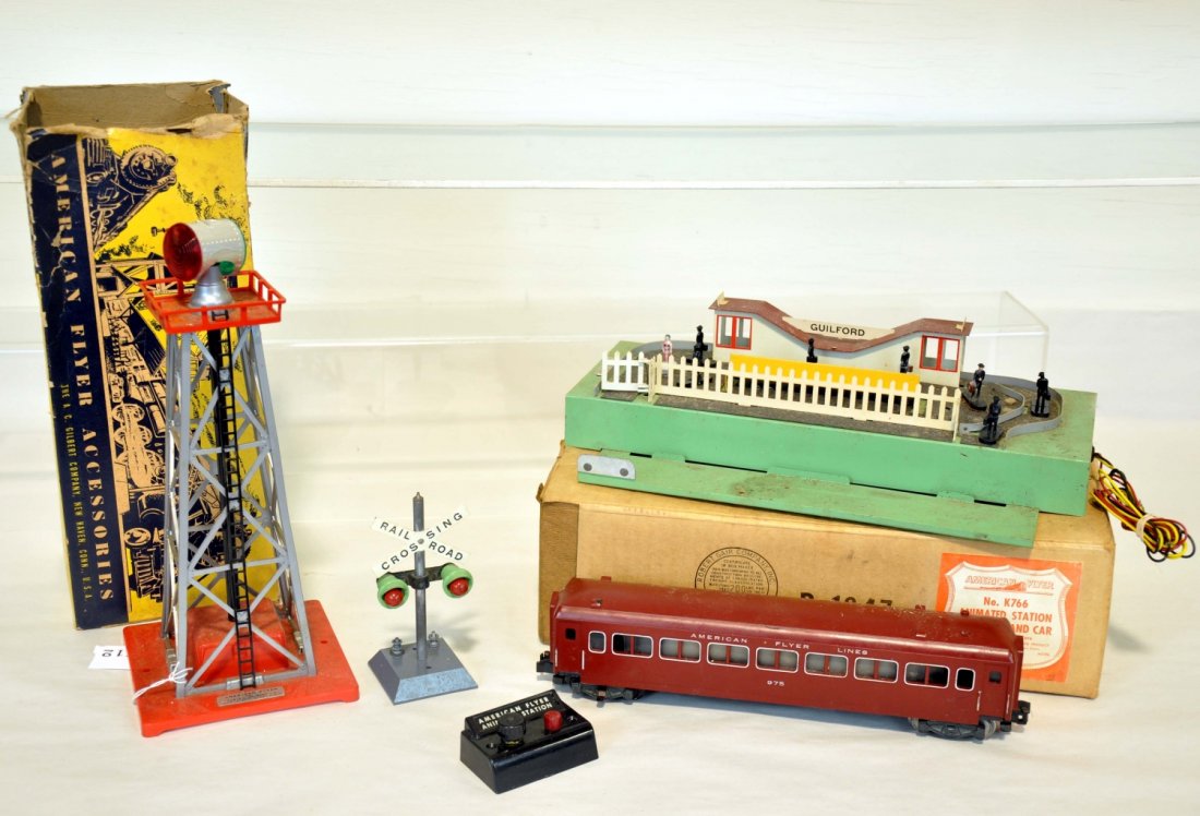 3 American Flyer Accessories: S Gauge. Includes a boxed 769A beacon; K766 animated station with 935 operating coach, controller, 8 figures, 5 are repro, all need pads, ob; 760 flasher. All show light to moderate playwear, C6-6+