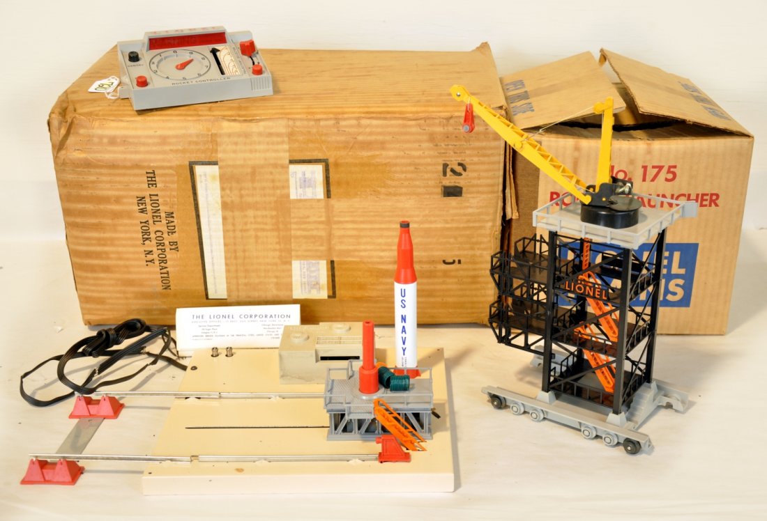 Double Boxed Lionel 175 Rocket Launcher: Original owner piece that was shipped in its master box. It is clean and complete, but has dry wire. It has a brick box with all its inserts and the 175-2 master box that was used as a shipper. It sho