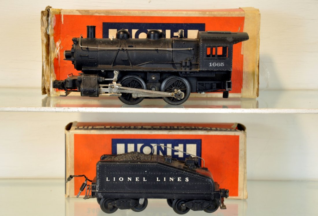 Scarce Boxed Lionel 1665 Switcher: 1st postwar steam switcher, circa 1946. Clean with nice cab lettering, missing 1 jewel; 2403B slant back tender with bell & light. They have matching matte patina and show light to moderate playwear w