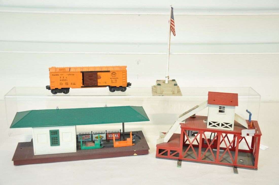 Lionel 352, 89 & 356 Accessories: Includes a 352 ice station, broom broken, some layout paint, has 6352 ice car with 4 cubes; 356 freight station with both carts, fence is broken; 89 flag pole, no Lionel flag, pole tabs broken, still 