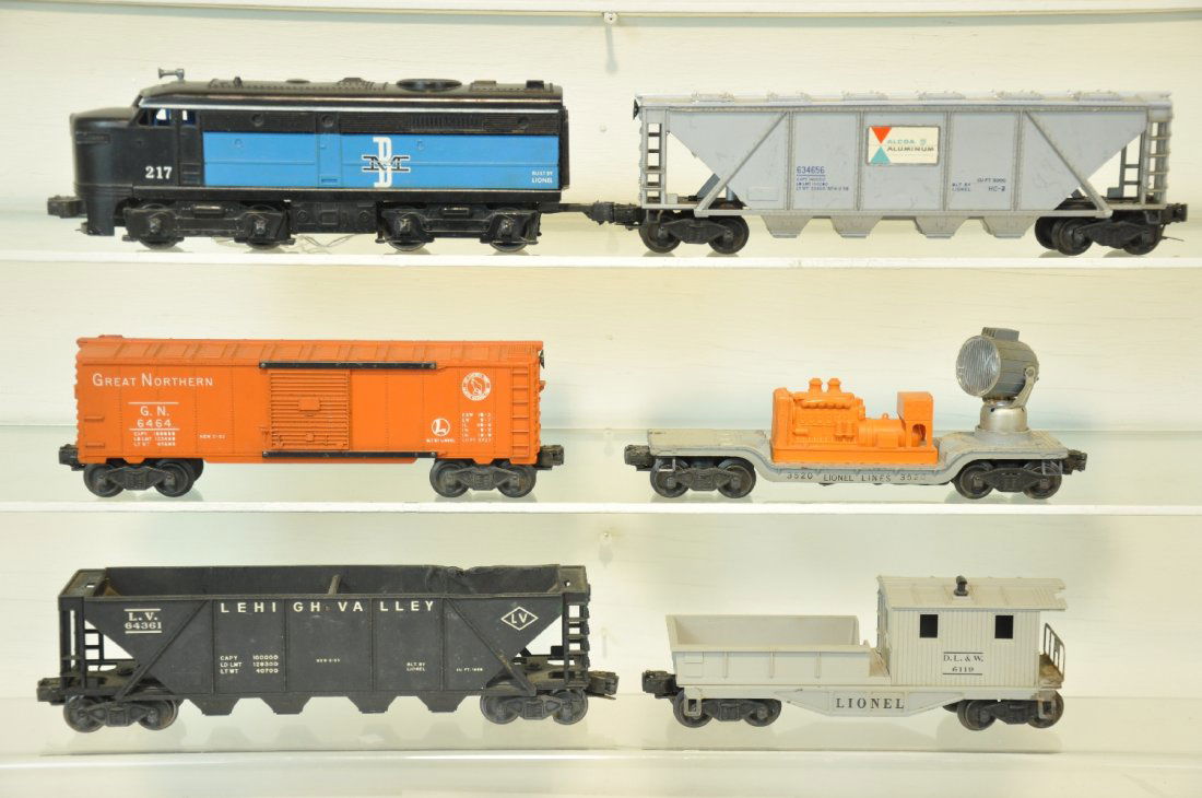 6Pc Lionel Lot: Includes a 217 B&M Alco dummy diesel; 6346 Alcoa covered quad hopper; 3520 searchlight car; 6464-25 GN boxcar, type I; 6436 LV quad hopper; 6119-50 work caboose. All have issues, so examine photos clo