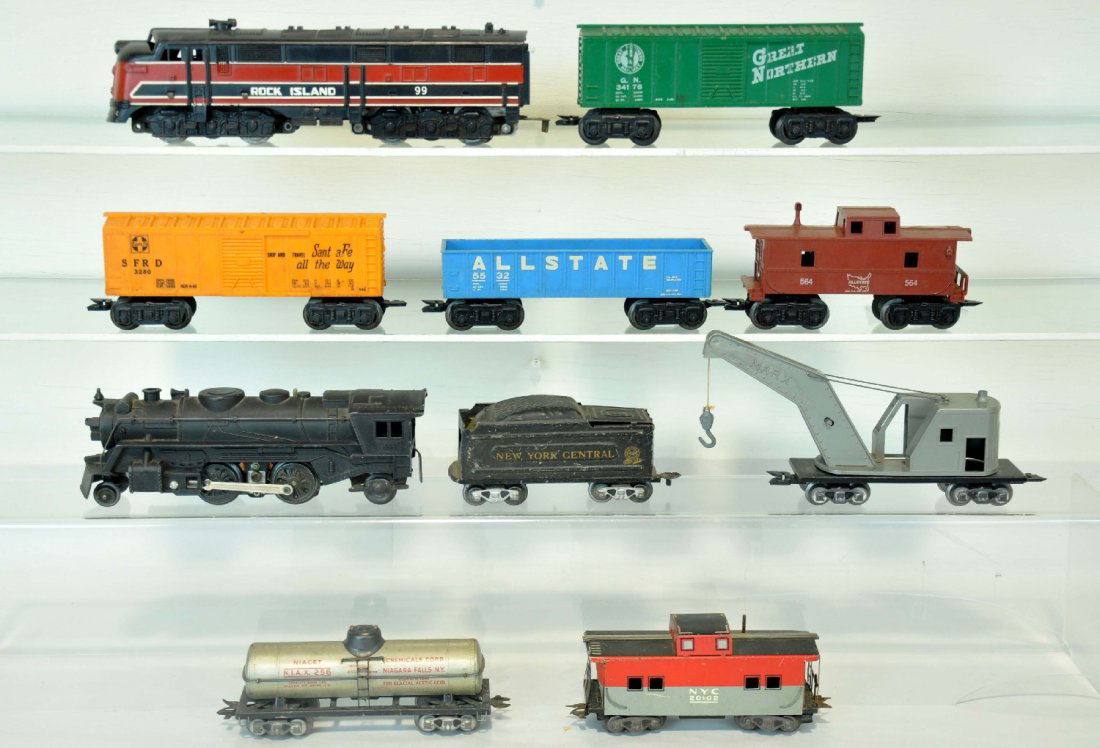 Marx Diesel & Steam Train Sets: Includes a 99 RI E7 diesel, steps intact; 2 boxcars; gondola and Allstate caboose; 666 cast steam loco; NYC wedge tender; tank car; crane & caboose all 3/16 trucks. Both sets show moderate playwear, C