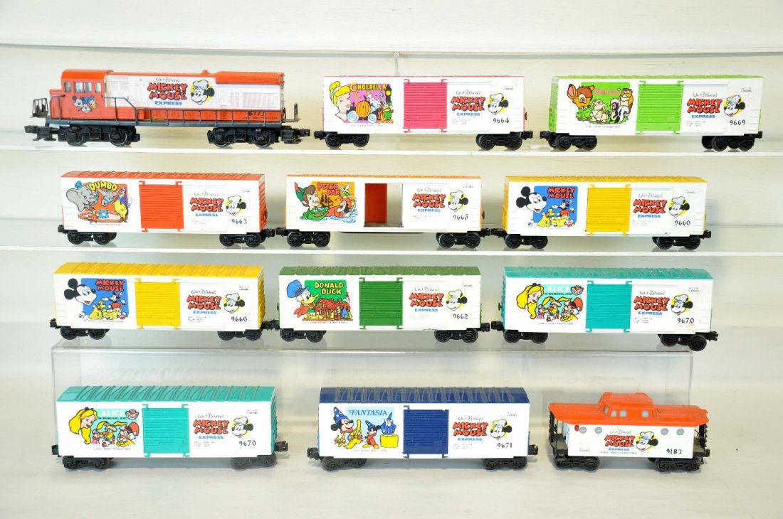 Lionel Disney Train Set: Includes an 8773 Mickey Mouse Express diesel; 10 assorted Disney boxcars; 9183 caboose. All show moderate playwear, C6-7