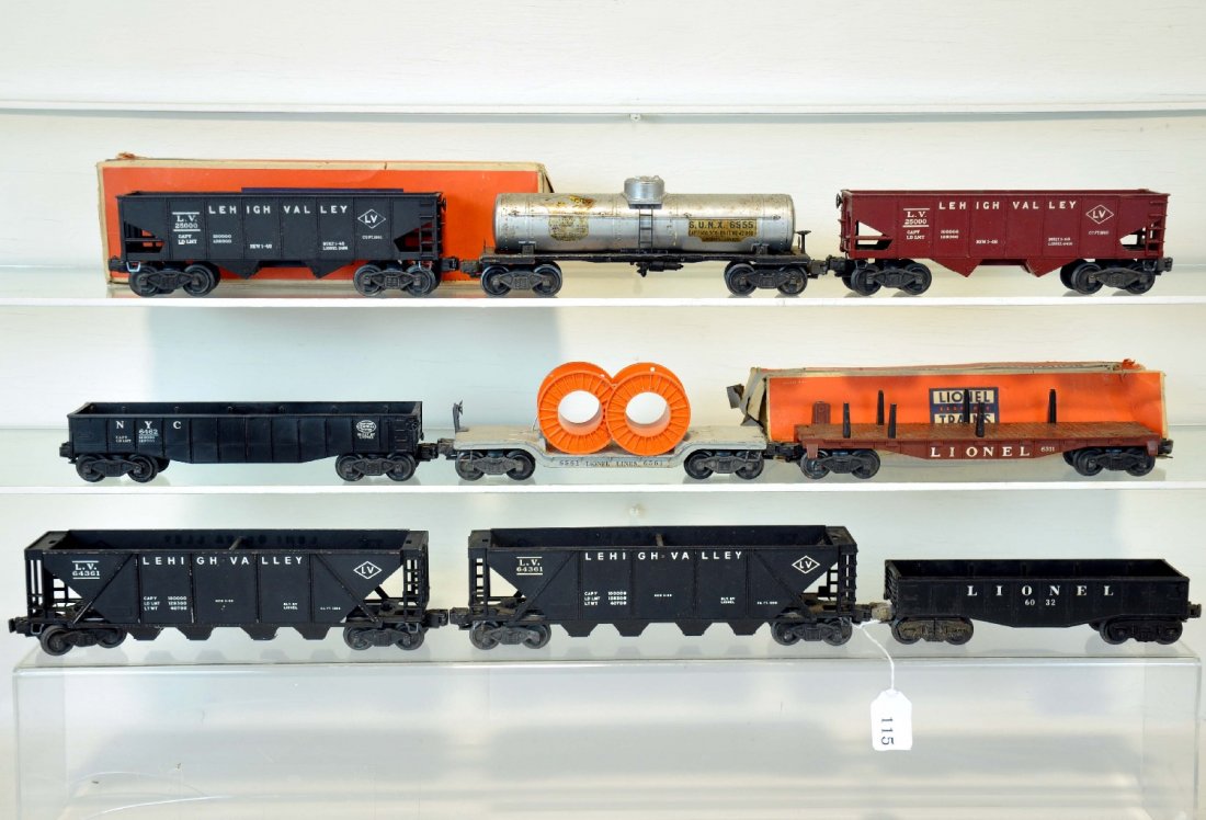Lionel Freight Cars: Includes 2 #6436 LV hoppers, 1 ob; 6032 gondola; 6555 tank car; 2 #6456 hoppers; 6311 flat with rough box; 6561 flat with empty reels; 6462 gondola. All show moderate playwear, C5-6