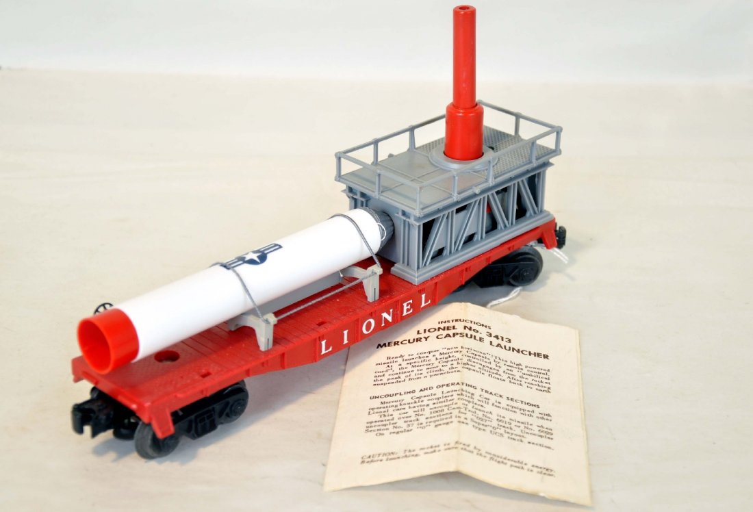 Lionel 3413 Mercury Capsule Launching Car: Clean with intact handrails and instruction sheet. Rocket is a reproduction, C8