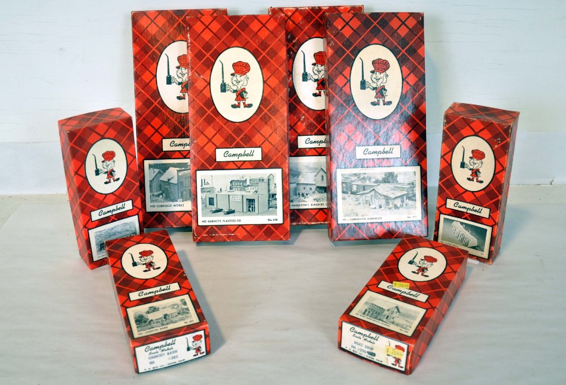 8 Boxed Campbell HO Kits: Nice early kits including wayside freight station; country barn; boat shop; Barnett Plastics Co; carriage works; Hamilton dingies; corrugated warehouse; curved trestle. They appear unbuilt and as new,