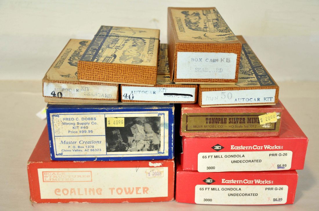 10 Early HO Kits: Includes 5 International's car kits; Muir Models Tonopah Silver Mine; 2 Eastern Car Works 65 ft gondola kits; Master Creations Dobbs Mining Supply co kit #40; SSL coaling tower. All appear like new an