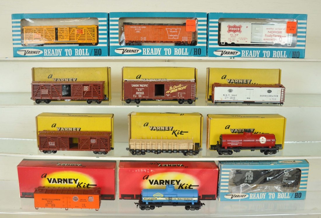 12 Early Varney HO Cars: Includes 6 very early yellow box examples; 2 kits and 4 blue-box ready to run models. All show light playwear with boxes, C7+-8