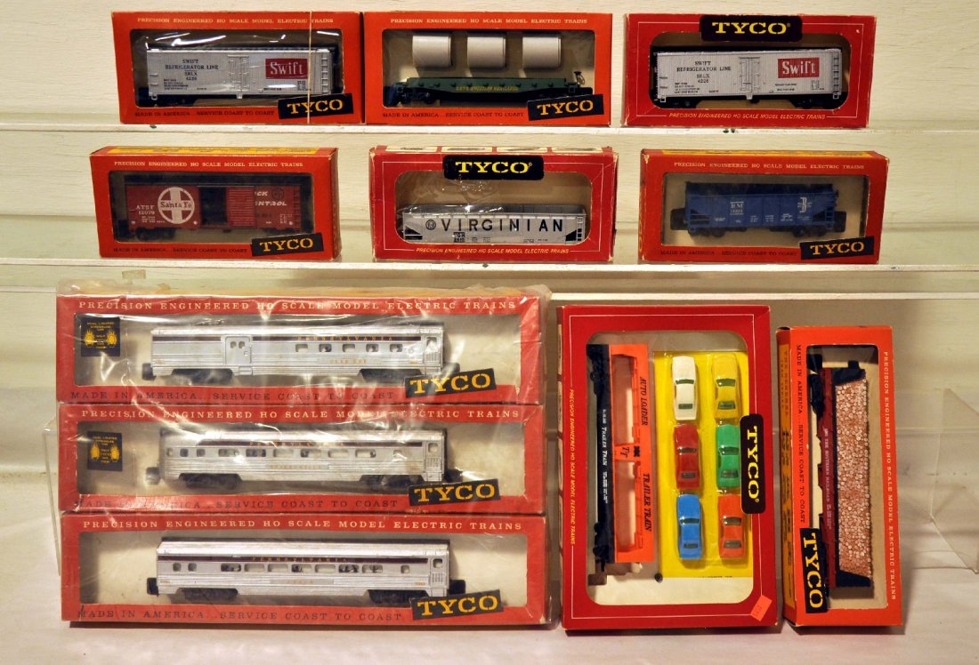 Early Mantua/ Tyco HO Rolling Stock: Includes 8 assorted freight cars with a scarce auto-loader, (Virginian hopper is cracked, C5); 3 illuminated PRR streamline passenger cars. All appear like new with boxes and most inserts, Otherwise C