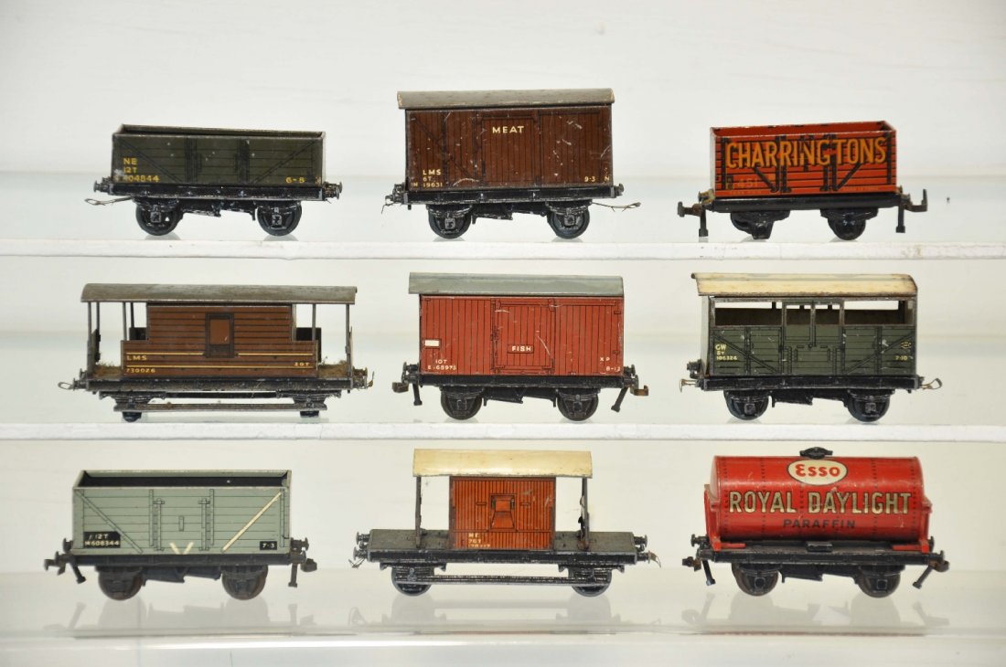 9 Hornby OO Freight Cars: OO gauge. Includes NE open car; LMS Meat reefer; GW open stock car; XP Fish reefer; Carrington's open car, 1 axle broken; NE brake van; LMS brake van, missing 1 end strut & wheels; gray open wagon; Ro