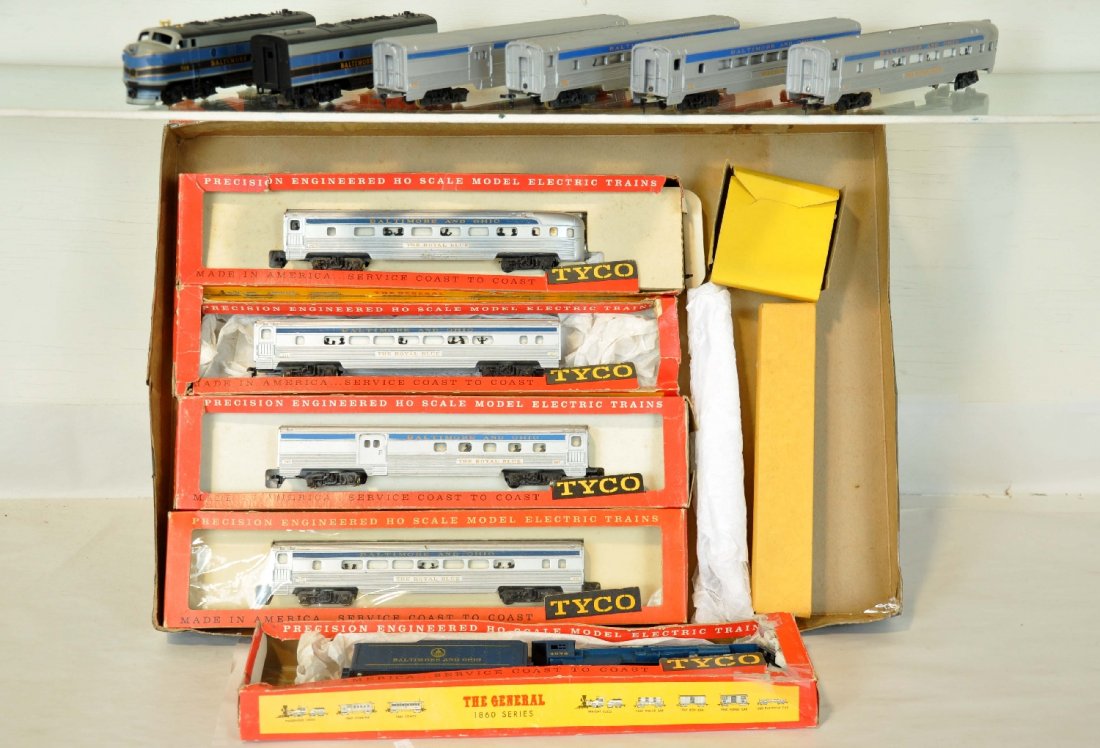 2 Tyco B&O HO Passenger Sets: Includes a boxed T6714-3998 steam set with a heavy pacific & 4 matching cars showing light playwear with boxes & setbox, C7+; B&O abs diesels with 4 cars showing moderate playwear, C6