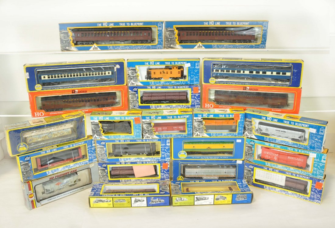 23 AHM/ RivaRossi HO Trains: Includes 17 freight cars and 6 passenger cars, 4 PRR & 2 Blue Comet. All show light runtime with boxes, C8+-9