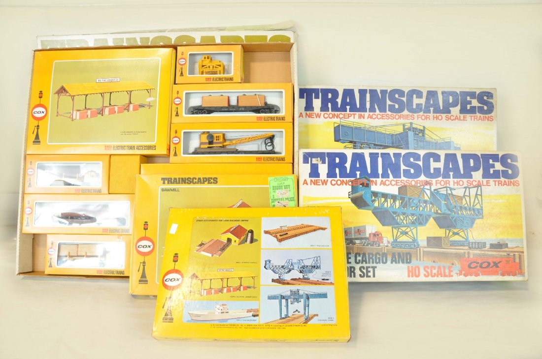 5 Unusual Cox HO Train Accessories: Includes a Big pine Sawmill & Lumber Yard Set; matching Lumber Shed & operating Sawmill; Dockside crane set; Dockside cargo & conveyor set. All appear like new with boxes, C9