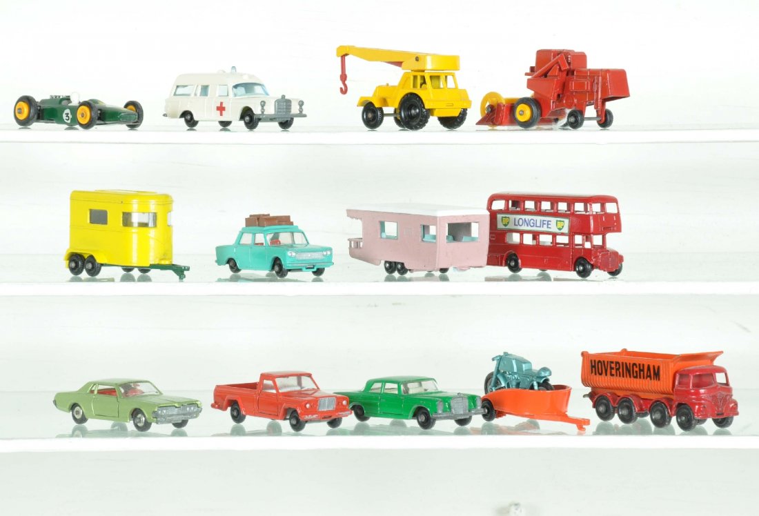 13 Matchbox Regular Wheel Vehicles: Circa 1966. includes 62 Cougar; 43 horse trailer, no animals; 17 tipper; 5 D-Decker bus; 3 ambulance; 11 jumbo crane; 19 racer, decals 85%; 71 Jeep pick-up; 56 Fiat, dark luggage; 38 Honda motorcycle 