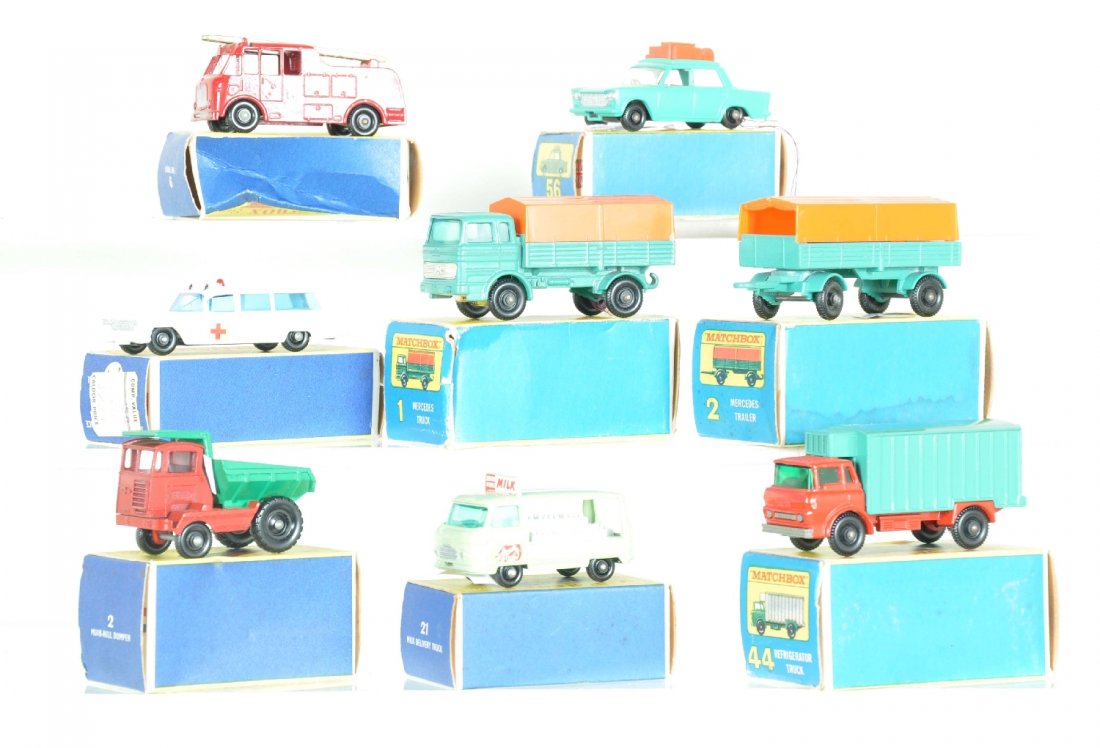 8 Boxed Matchbox Vehicles: Includes 64 ambulance; 1 Mercedes truck with #2 matching trailer; 56 Fiat, light luggage; 2 Lang tipper; 21 milk float; 44 refrigerator truck, 9 fire engine, C7, dented box. Otherwise all show light w