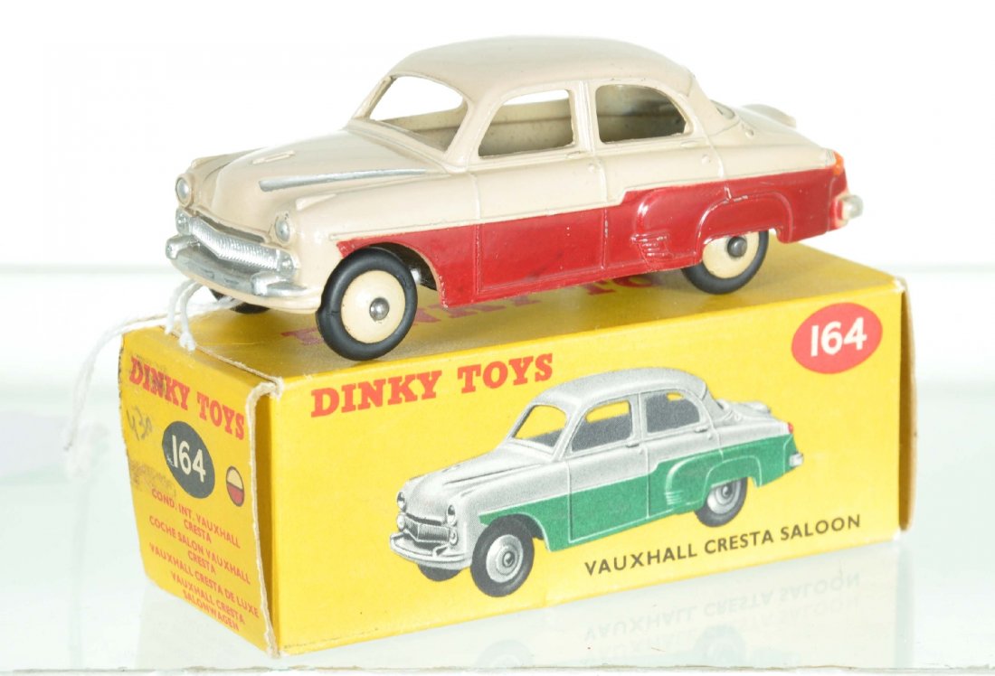 Boxed Dinky Vauxhall Cresta: Nice 2-tone example with tan hubs. It is very clean with minor high-spot rubs on rear fender covers. It has its correct color coded box, C8+-9