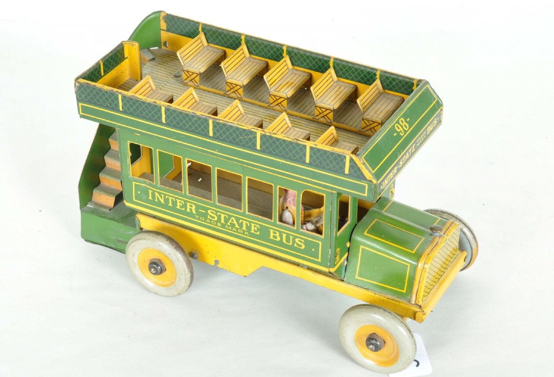 Strauss Inter-State Bus: Circa 1920s. Litho tin, 10" long, clean and shiny. Nice example, but the mechanism is incomplete. It shows light playwear, C7