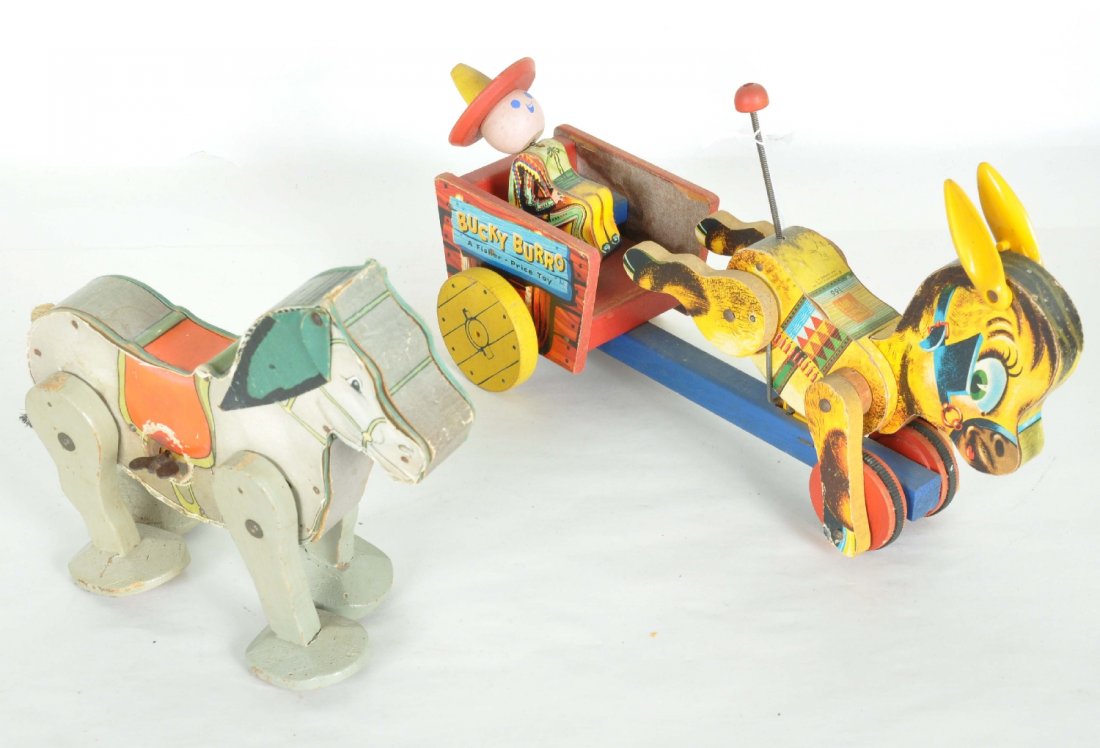 2 Scarce Fisher Price Toys: Includes a No ?60 mechanical donky, mechanism is functional, Circa 1930s. Working. Marked "Fisher-Price Toys Aurora, NY". Original oil cloth ears and tail. Some creasing and paper loss and one split t