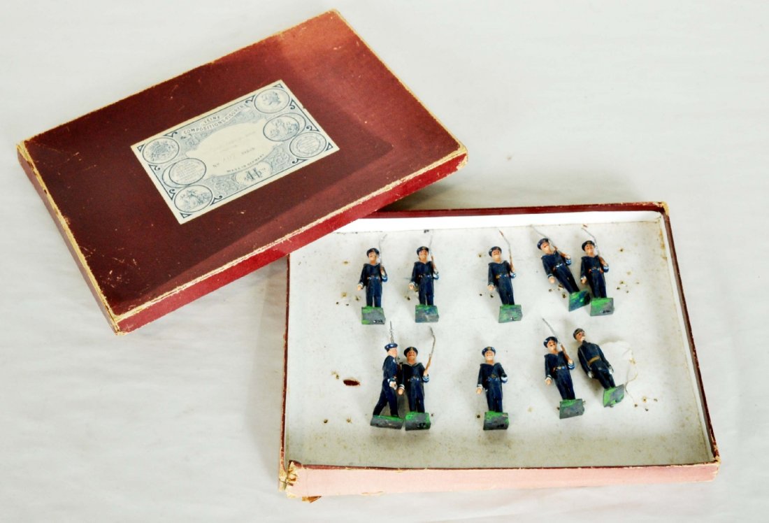 Boxed Heyde Set 407 American Sailors: Great set, often accompanying Marklin & Bing boats. There are 10 figures with officer and 9 marching. One is missing his weapon. It has an insert and box with worn top. Clear label and they show light