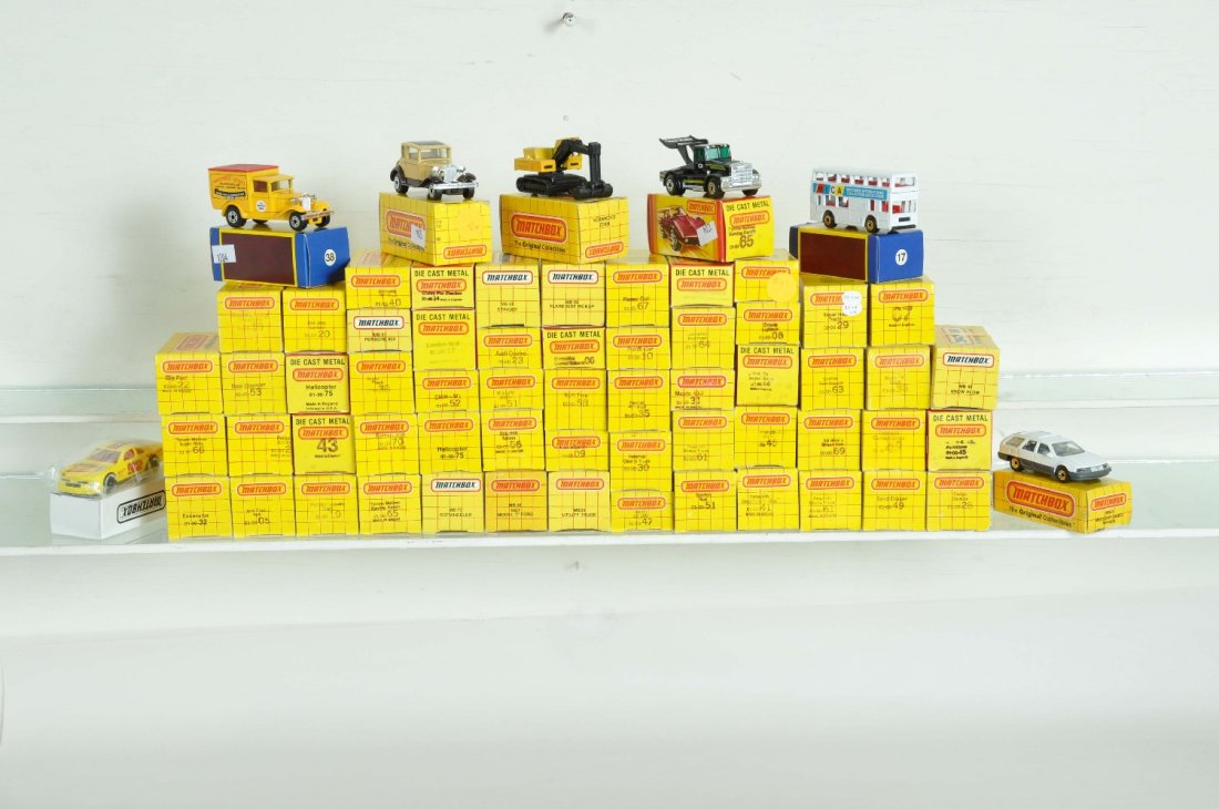 64 Matchbox Vehicles: Most from 1982 & 3 with all being mint in box, see photos for inventory, C10