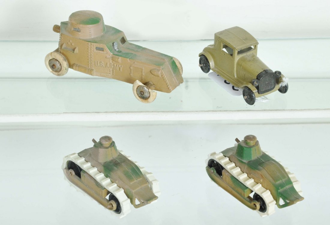 2 TootsieToy Military Vehicles: Includes 2 tanks, replaced treads; armored car, small loose gun and 1 tire incomplete; tan Ford. All otherwise show light playwear, Otherwise C8