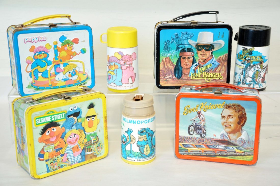 4 Vintage Litho Tin Lunch Boxes: Includes Aladdin Evil Knieval, 1974, C6+; Aladdin Sesame Street, with plastic thermions, C4; Aladdin Legend of the Lone Ranger with plastic thermos, 1980, C8; Aladdin Popples with plastic thermos, C4