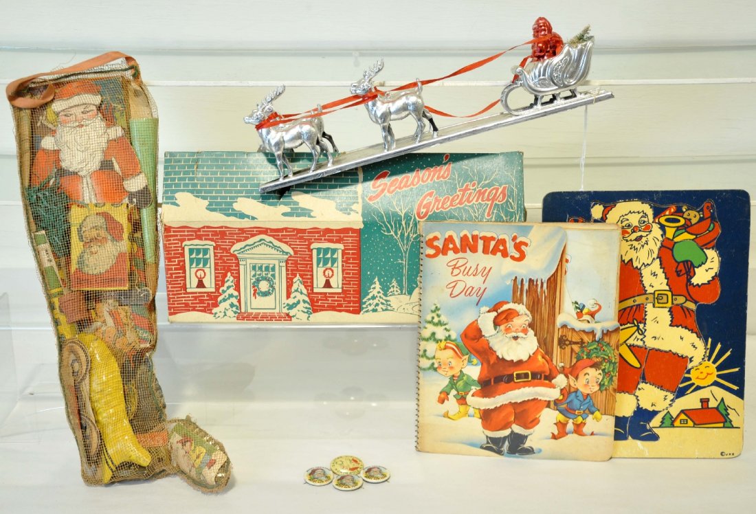 8Pc Vintage Christmas Toys Lot: Includes an interesting Bradford Santa Clause & Reindeer display, 19 X 12 1/2"; Dimestore Christmas stocking sealed with original prizes; JKS wood hand painted puzzle; 1953 Santa's' Busy Day pop-up bo